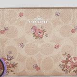 COACH Corner Zip Wristlet In Signature Canvas With Floral Print Sand Multi CAQ59