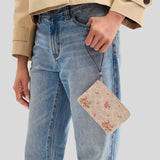 COACH Corner Zip Wristlet In Signature Canvas With Floral Print Sand Multi CAQ59