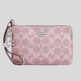 COACH Boxed Corner Zip Wristlet In Signature Canvas With Charms Pink/Rose CCK93