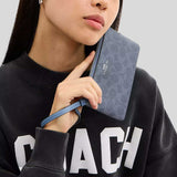 COACH Corner Zip Wristlet In Signature Canvas Chambray/Silver CAQ75