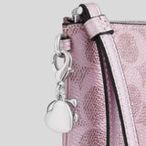 COACH Boxed Corner Zip Wristlet In Signature Canvas With Charms Pink/Rose CCK93