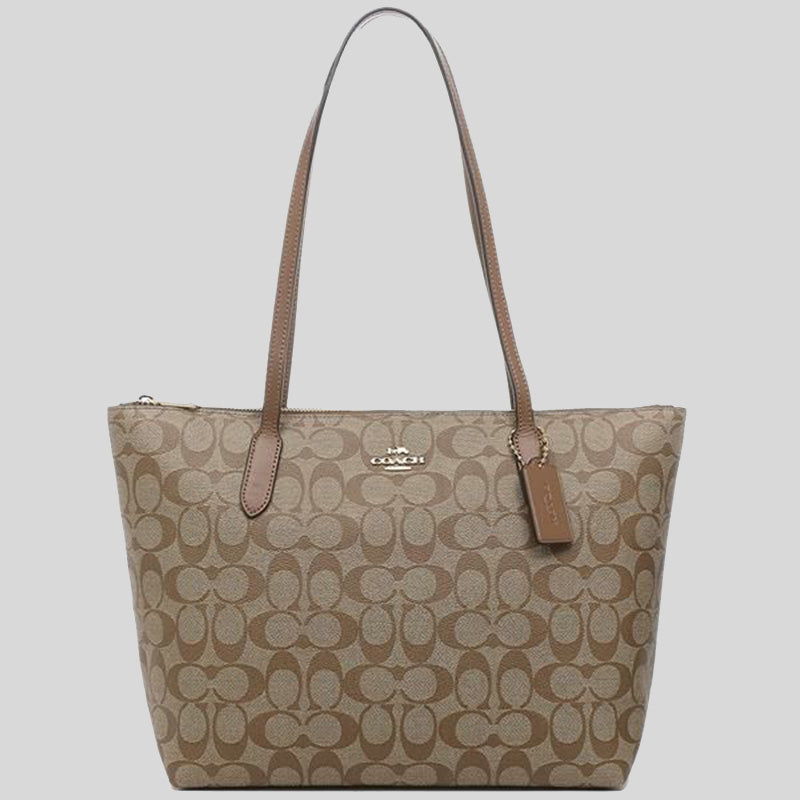 City zip tote in signature canvas coach 2025