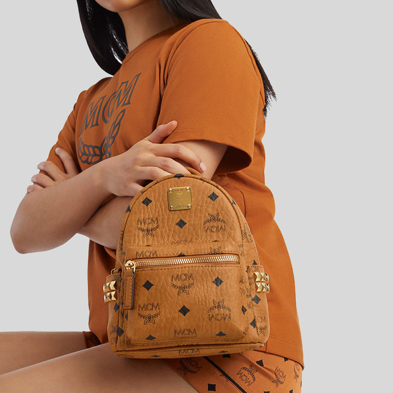 MCM Stark Side Studs Bebe Boo Backpack in Visetos Cognac MMKDSVE11CO001