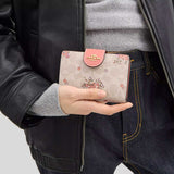 COACH Medium Corner Zip Wallet In Signature Canvas With Floral Print Sand Multi CAO99