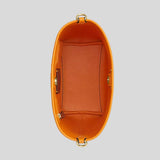 COACH City Bucket Bag In Signature Canvas With Star Charm Tan/Bright Mandarin CBH74