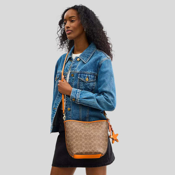 COACH City Bucket Bag In Signature Canvas With Star Charm Tan/Bright Mandarin CBH74