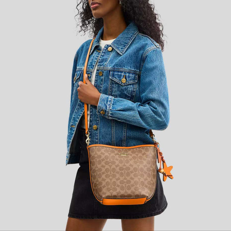 COACH City Bucket Bag In Signature Canvas With Star Charm Tan/Bright Mandarin CBH74