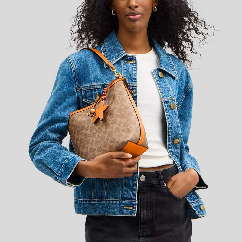 COACH City Bucket Bag In Signature Canvas With Star Charm Tan/Bright Mandarin CBH74