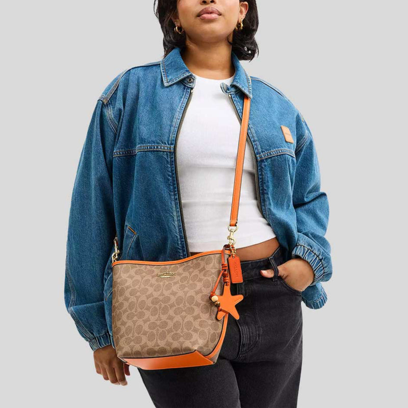 COACH City Bucket Bag In Signature Canvas With Star Charm Tan/Bright Mandarin CBH74
