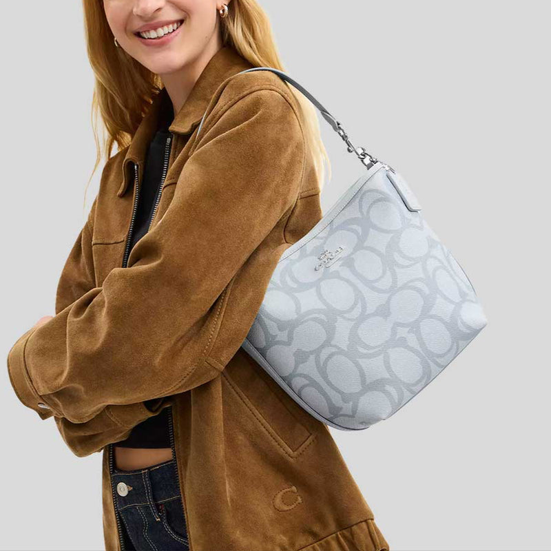 COACH City Bucket Bag In Sketch Signature Canvas Ice Blue CBH90