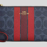 COACH Corner Zip Wristlet In Signature Canvas With Varsity Stripe Denim/Bold Red CBP19