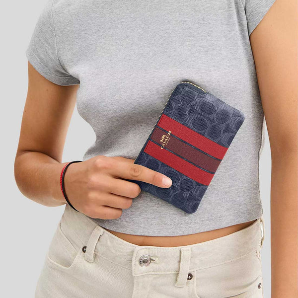COACH Corner Zip Wristlet In Signature Canvas With Varsity Stripe Denim/Bold Red CBP19