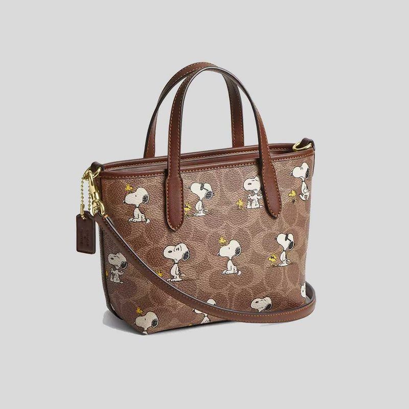 COACH Coach X Peanuts City Mini Tote Bag In Signature Canvas With Snoopy Print Tan/Brown Multi CBS83