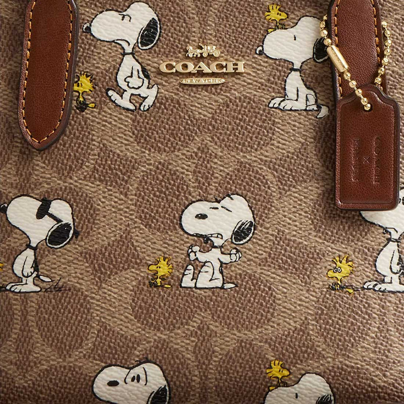 COACH Coach X Peanuts City Mini Tote Bag In Signature Canvas With Snoopy Print Tan/Brown Multi CBS83