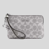 COACH Boxed Corner Zip Wristlet In Signature Canvas With Charms Gray/Silver CCK93