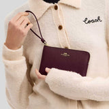 COACH Corner Zip Wristlet Dark Wine CV396