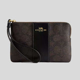 COACH Corner Zip Wristlet In Signature Canvas With Stripe Walnut/Black CW854