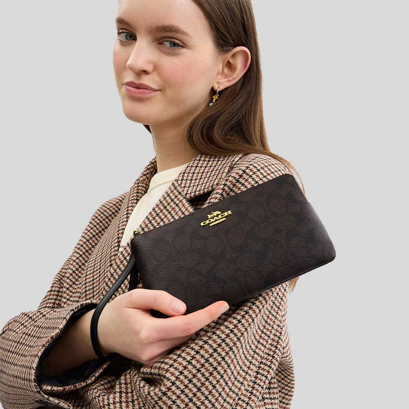 COACH Large Corner Zip Wristlet In Signature Canvas Walnut/Black CZ277