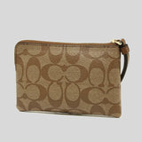 Coach Corner Zip Wristlet In Signature Canvas Khaki/Saddle 58035