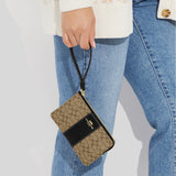 COACH Corner Zip Wristlet In Signature Canvas Khaki/Black CJ792