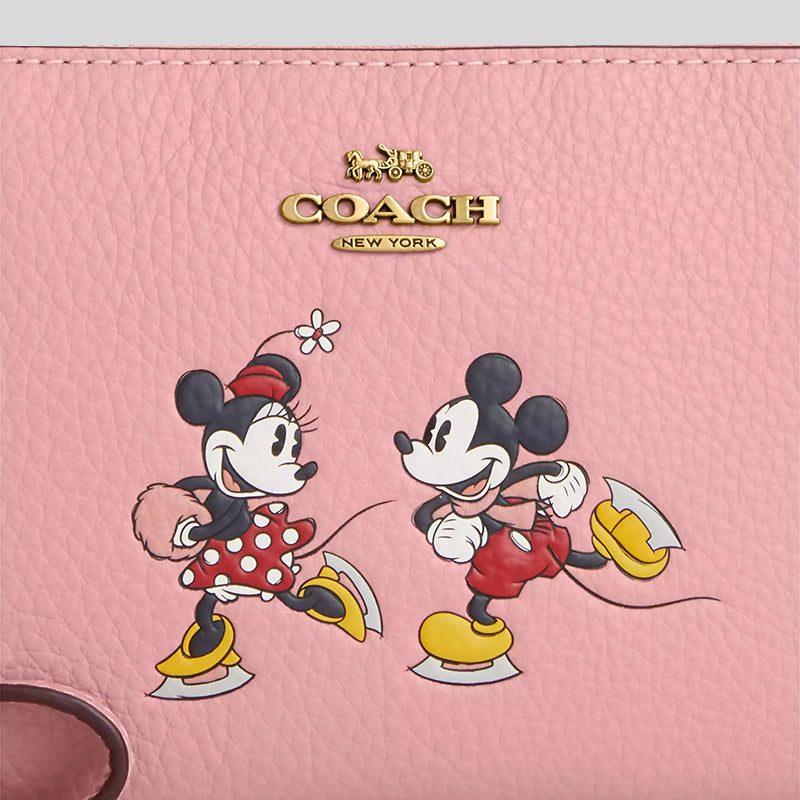 COACH Disney X Coach Corner Zip Wristlet With Ice Skate Motif Light Blush Multi CN026