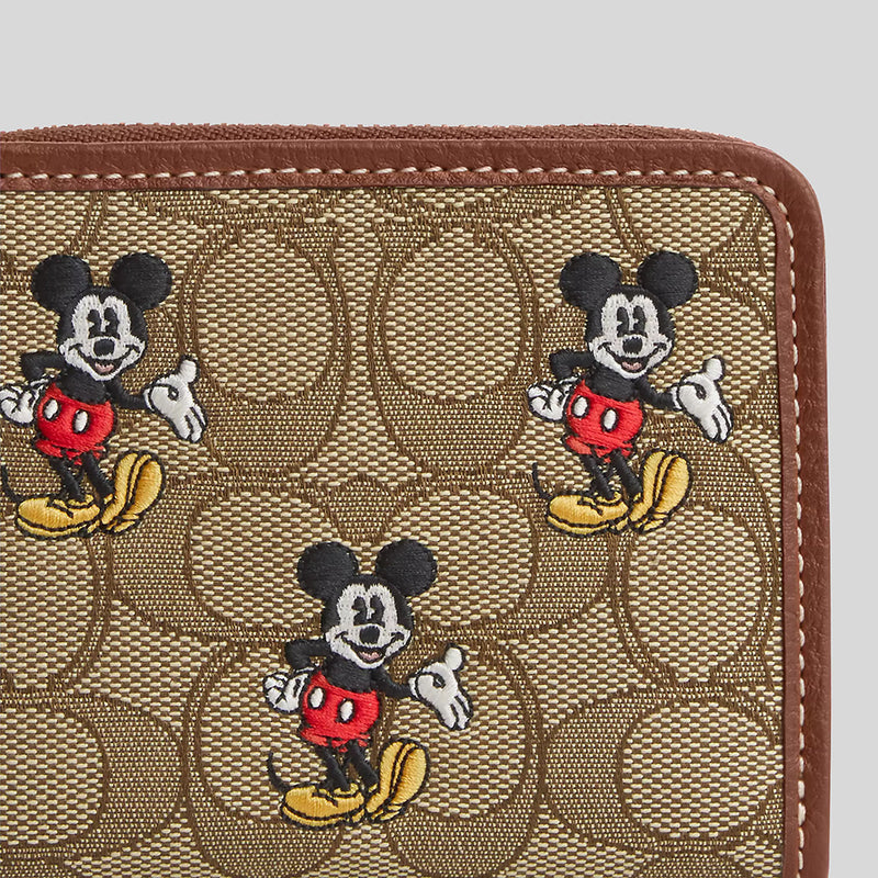 COACH Disney X Coach Small Zip Around Wallet In Signature Jacquard With Mickey Mouse Print Khaki/Redwood Multi CN035