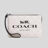 COACH Corner Zip Wristlet In Signature Canvas Chalk Multi CP437