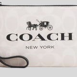 COACH Corner Zip Wristlet In Signature Canvas Chalk Multi CP437