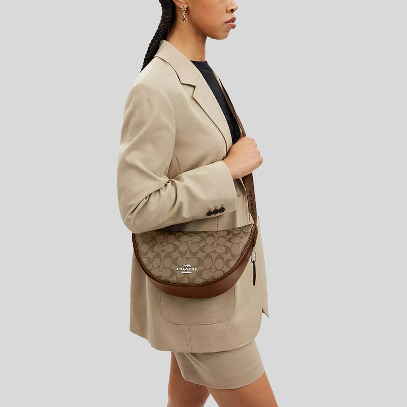 COACH Pace Shoulder Bag In Signature Canvas Khaki/Saddle CT643