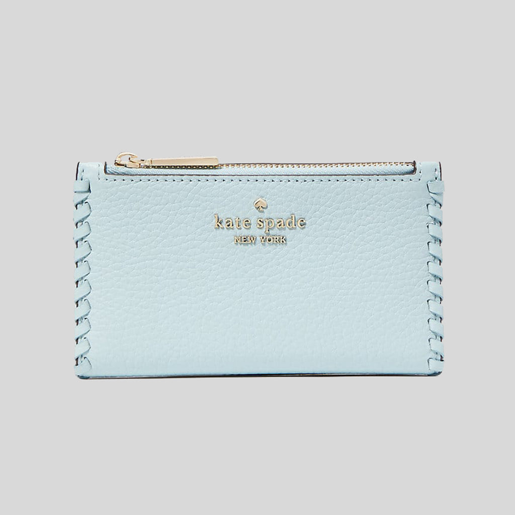 Comparison of Kate Spade's small Leila wallet and the Coach small