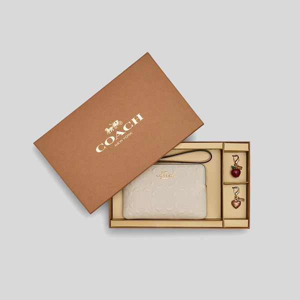 Boxed corner zip wristlet in top signature leather