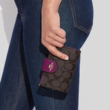 Coach Medium Corner Zip Wallet In Signature Canvas Brown Dark Magenta C0082