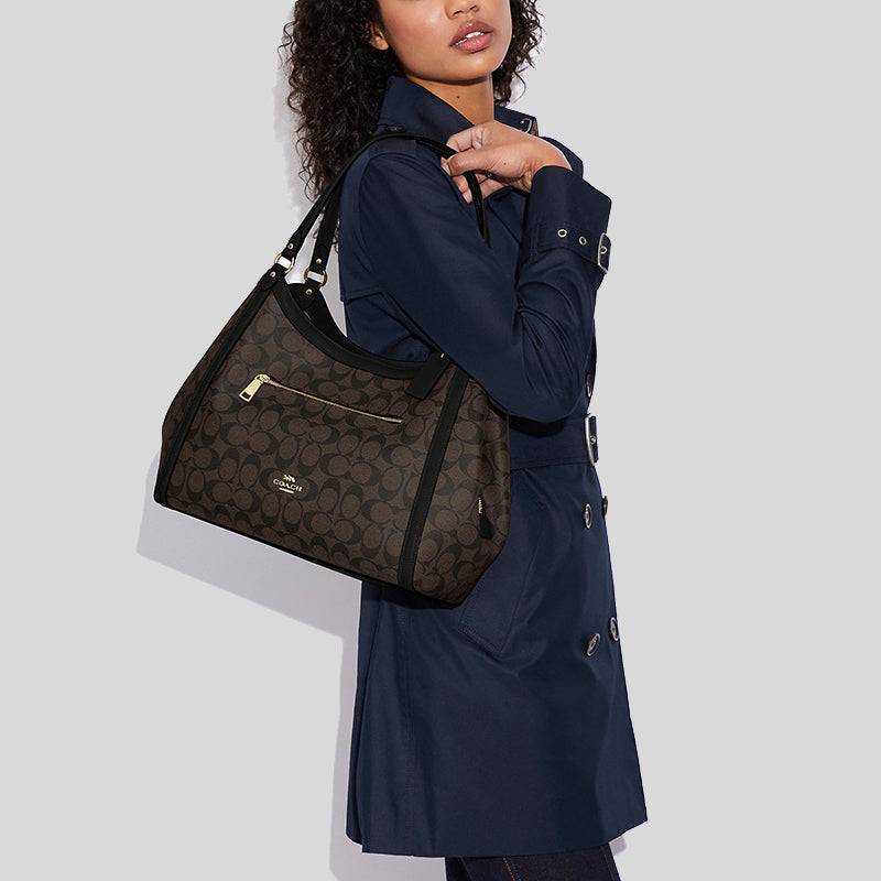Coach small marlon shoulder 2025 bag in signature canvas