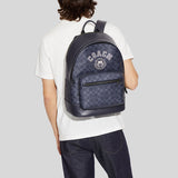 Coach West Backpack In Signature Canvas With Varsity Motif Denim CB909