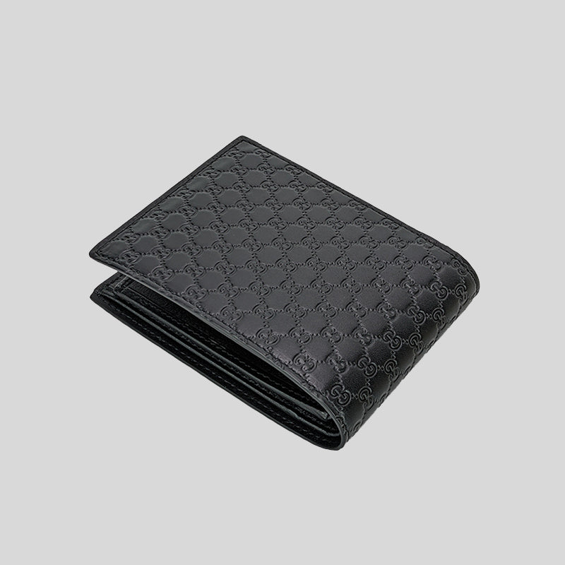 GUCCI Calfskin GG Embossed Perforated Bi-Fold Wallet Black 1189094