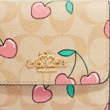 Coach Small Trifold Wallet In Signature Canvas With Heart Cherry Print CF399